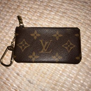 Authentic Louis Vuitton change purse key holder.
